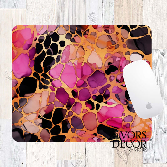 abstract cheetah print in shades of magenta, pink, plum, and gold with a zipper closure, shown on a wood background with Favors Decor & More logo.