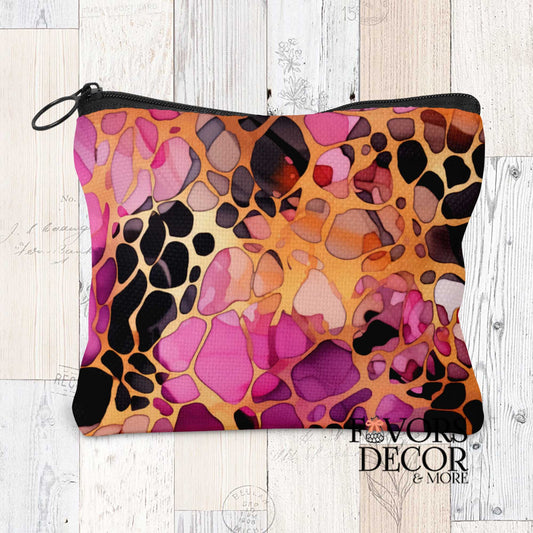 Berry Cheetah Pouch featuring an abstract cheetah print pattern in shades of fuchsia, purple, deep red, golden orange, and black, with a black zipper.