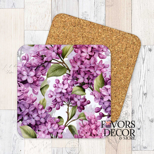 Purple floral drink coasters featuring lilac and violet blooms with green leaves