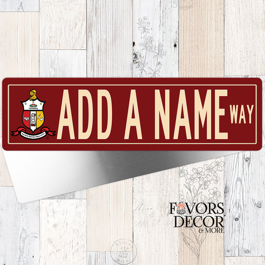 Kappa Alpha Psi street sign featuring the fraternity's crest on the left and the customizable text "ADD A NAME WAY" in the center.