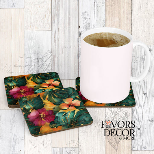 Three Monstera Drift Coasters with a white coffee mug sitting on one, showcasing a lush tropical design of deep green monstera leaves and vibrant hibiscus flowers in magenta, coral, and gold, against a light wood background.