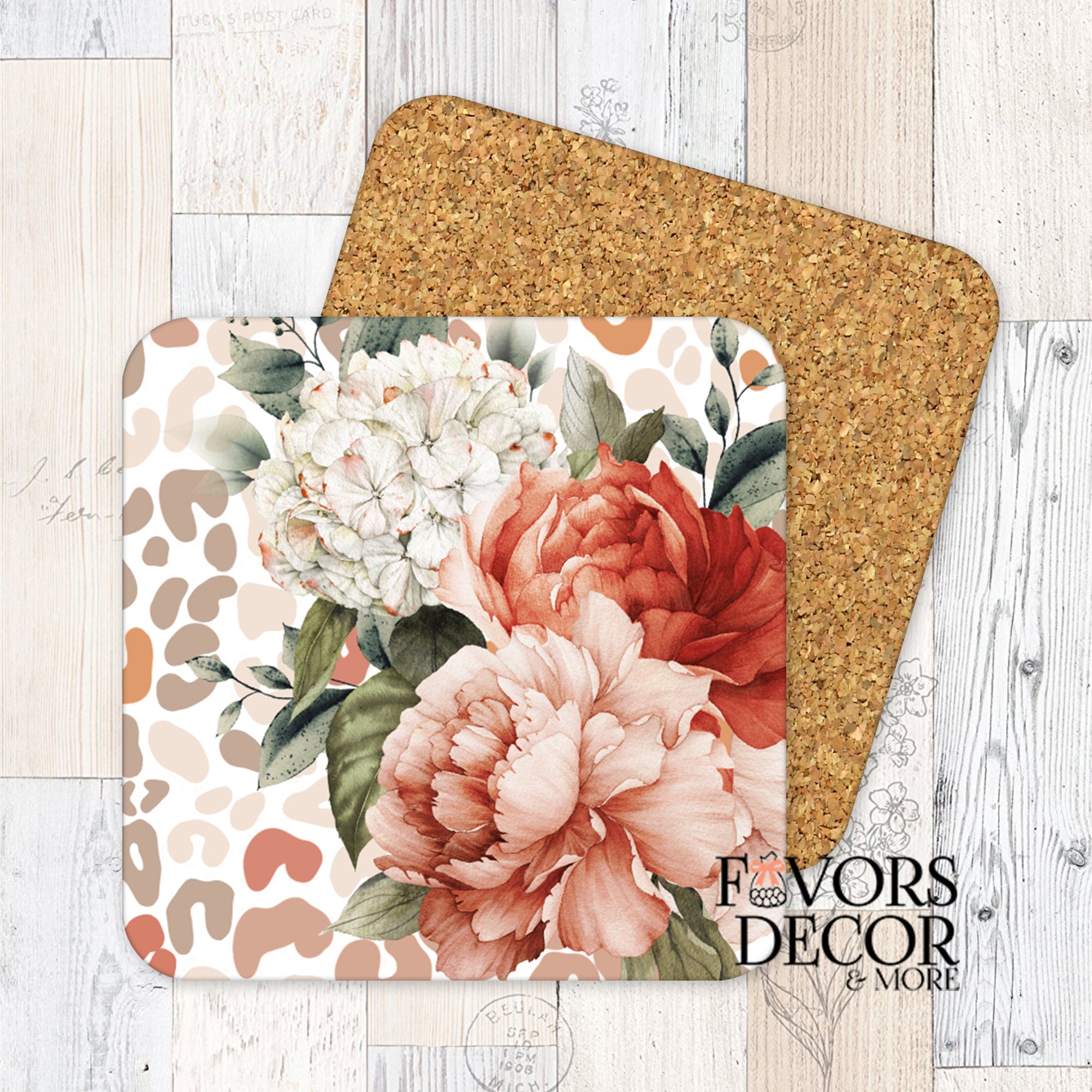 Square coaster with peach and white watercolor flowers over a taupe leopard print background, backed with cork.