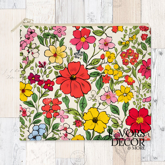Reusable sandwich pouch with colorful red, yellow, and pink floral pattern on cream background