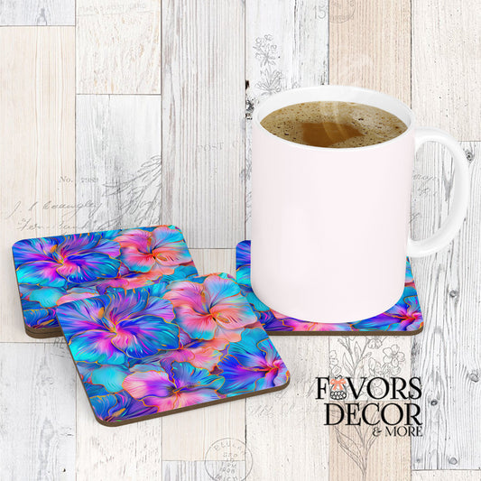 Three tropical radiance hibiscus print coasters with a white coffee mug sitting on one, showcasing the vibrant blue, purple, and pink flowers with gold outlines