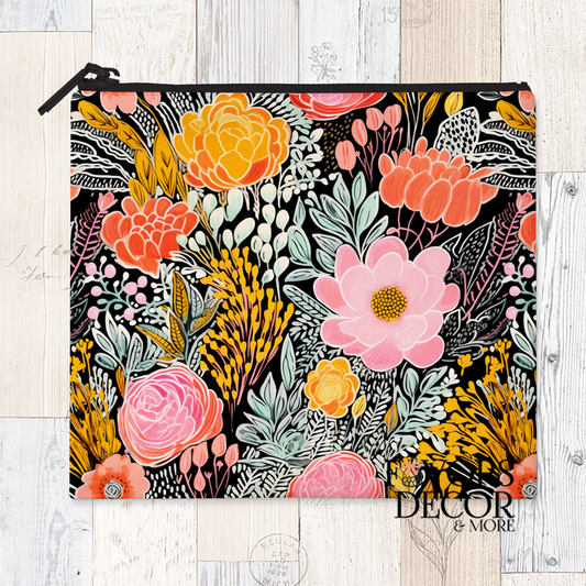 A reusable sandwich pouch featuring a black and white abstract botanical or leaf pattern on the exterior. The pouch has a white zipper closure and is made with a food-safe PUL fabric lining.