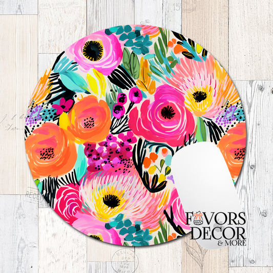 Colorful floral design on a round mouse pad from 'Favors Decor & More' branding.